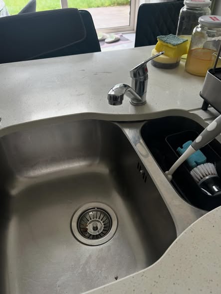 Old sink setup before plumbing work